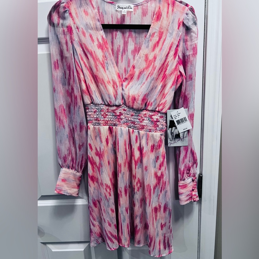 Honey&Rosie, fun dress for several occasions. Beautiful colors, never been worn.